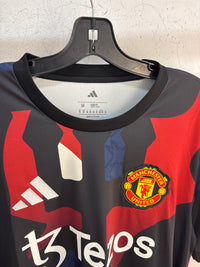 2024 Manchester United Pre
Match Kit - Size M/L