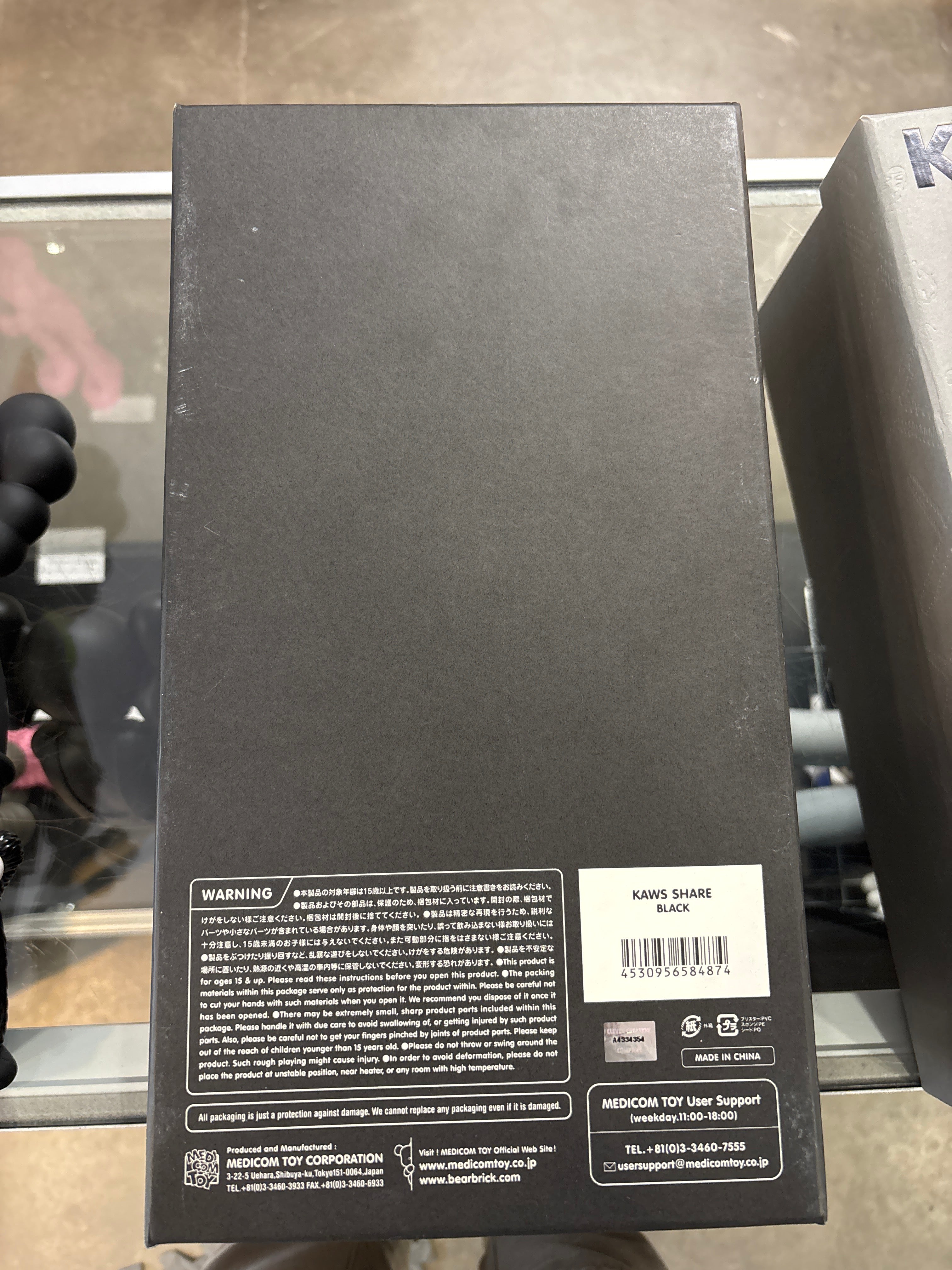 KAWS Share Black