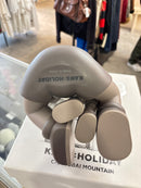 KAWS Holiday Brown