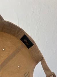 New dime tan cap